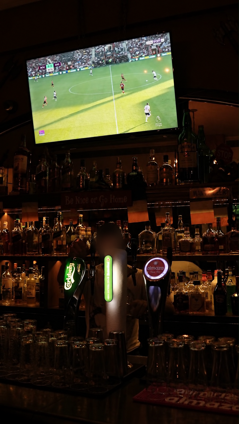 Live football shown above the bar at Celtic Irish Bar